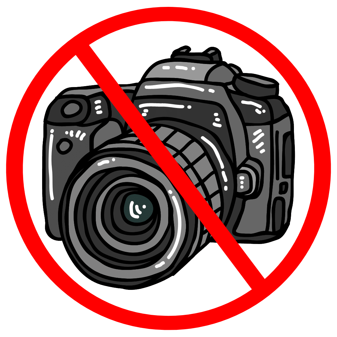A camera drawing with a red line across it