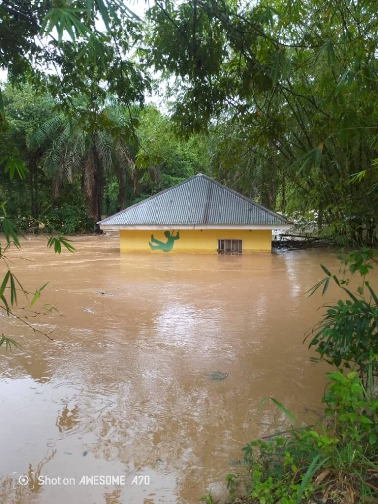 Building exterior with water almost to roofline
